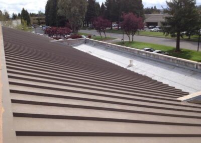 Custom metal commercial roof with downward slats.