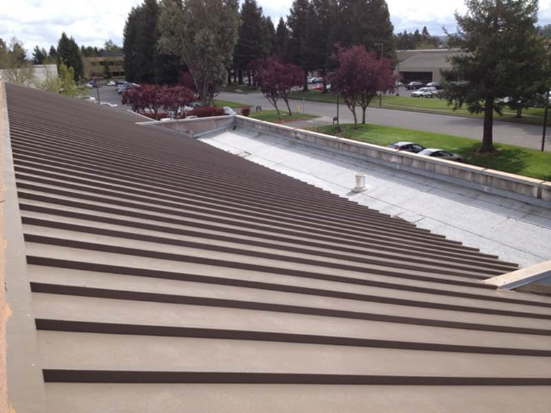 Custom metal roof with downward slats.